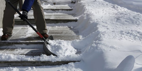 How to shovel snow properly without throwing out your back
